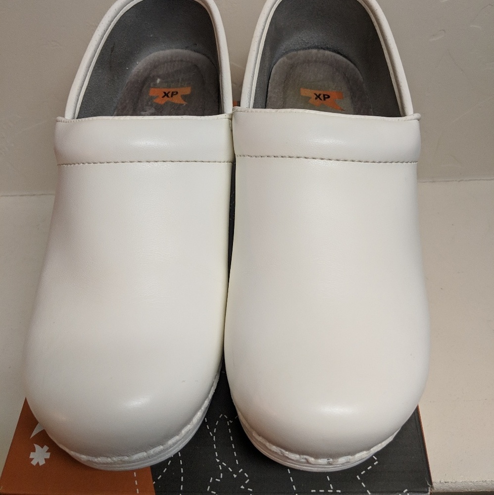 Dansko XP white leather clogs